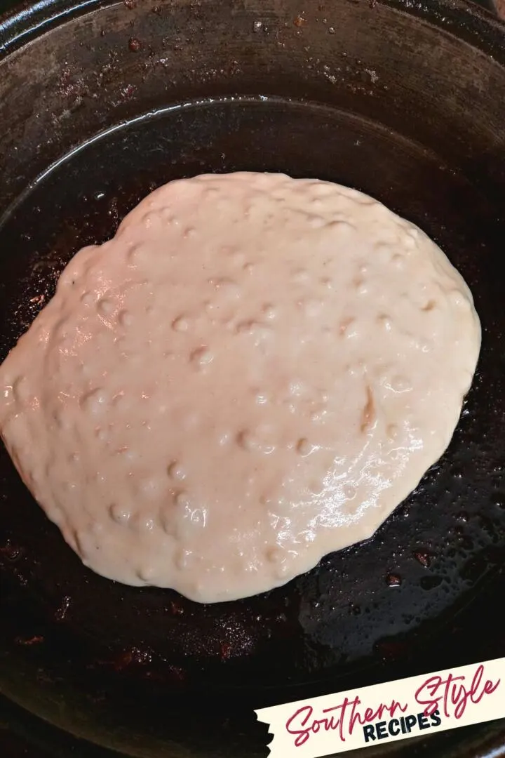 smooth pancake batter in skillet